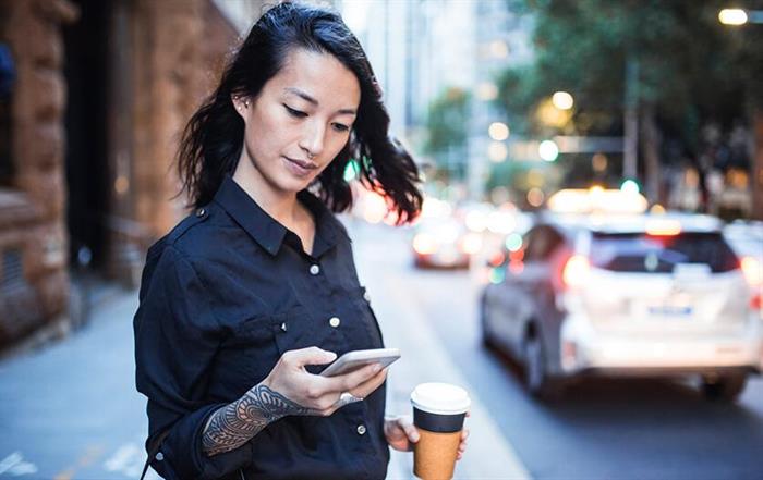 Woman using the CBHS app