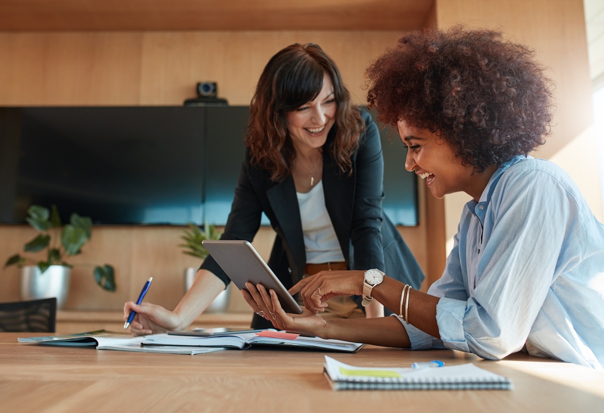Young international students on their laptops purchasing health insurance for their bridging visa 020