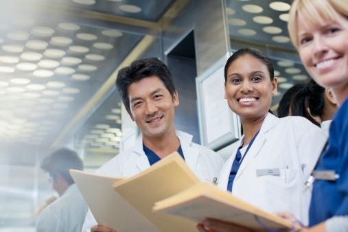 A doctor checking with the patient