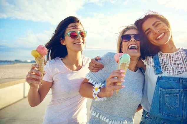 Three ladies from around the world enjoying life knowing they have good health insurance
